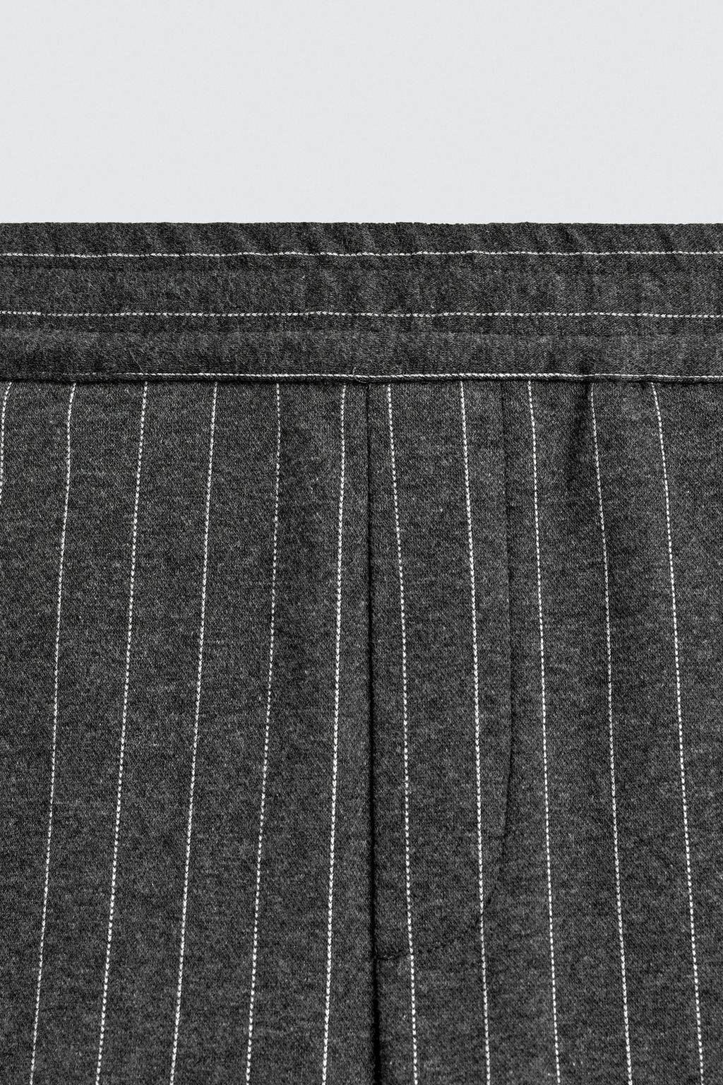 БРЮКИ В ТОНКУЮ ПОЛОСКУ СО СКЛАДКАМИ