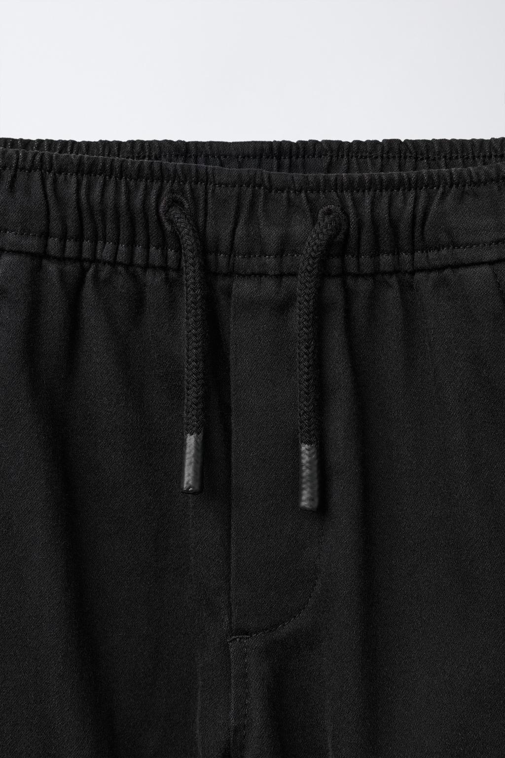 БРЮКИ-ДЖОГГЕРЫ КАРГО С ЭТИКЕТКОЙ