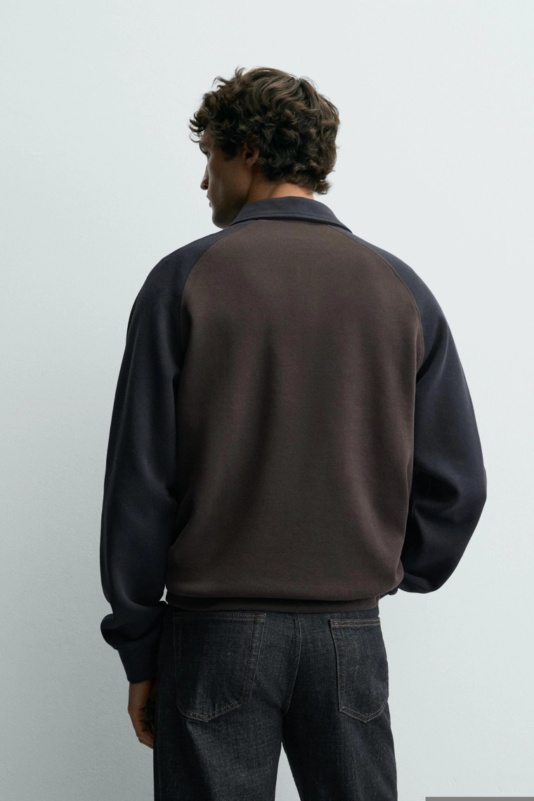 Поло с блоками цветов и реглановыми рукавами