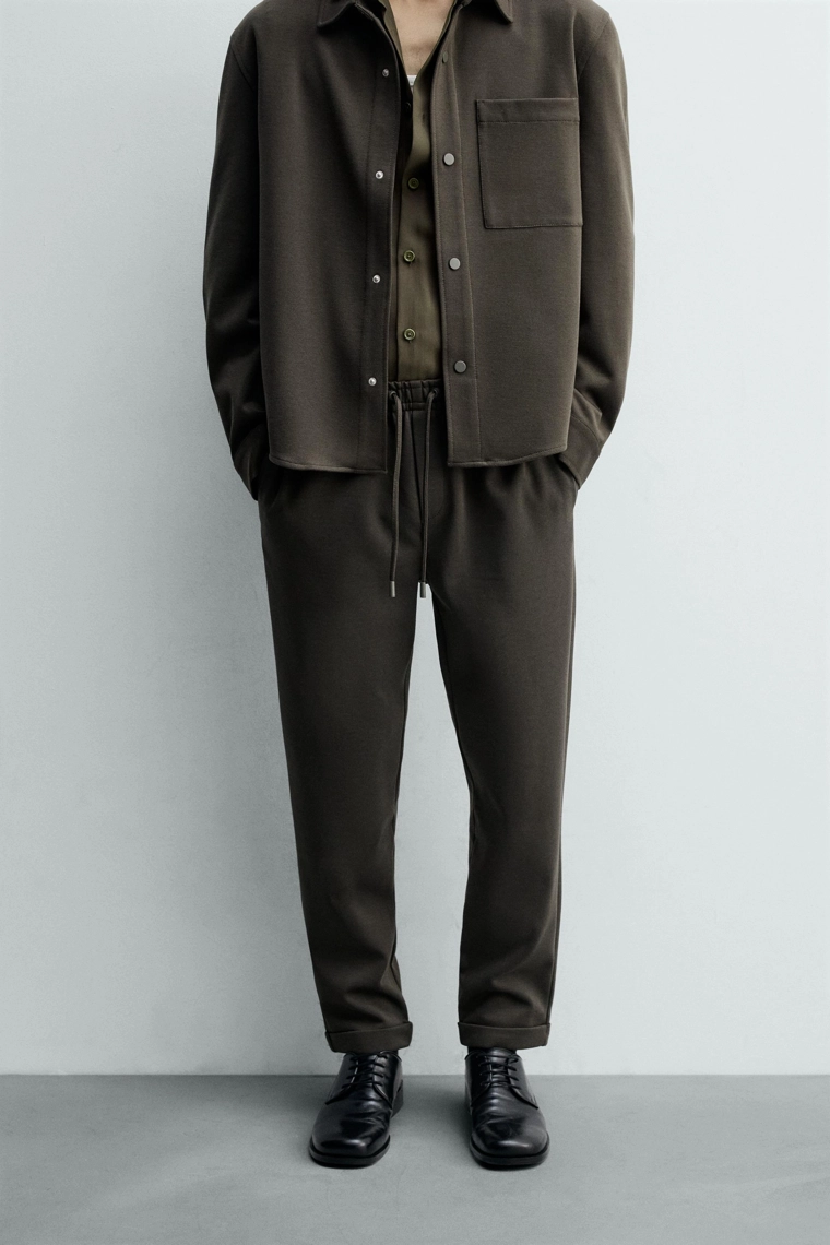 Комфортные несминаемые брюки с манжетами на талии