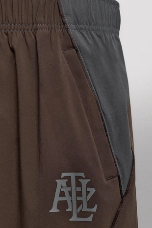 Футбольные брюки из высокотехнологичной ткани в стиле колор-блок- Заказать в России