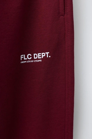 Брюки-джоггеры из мягкой ткани с текстом- Заказать в России