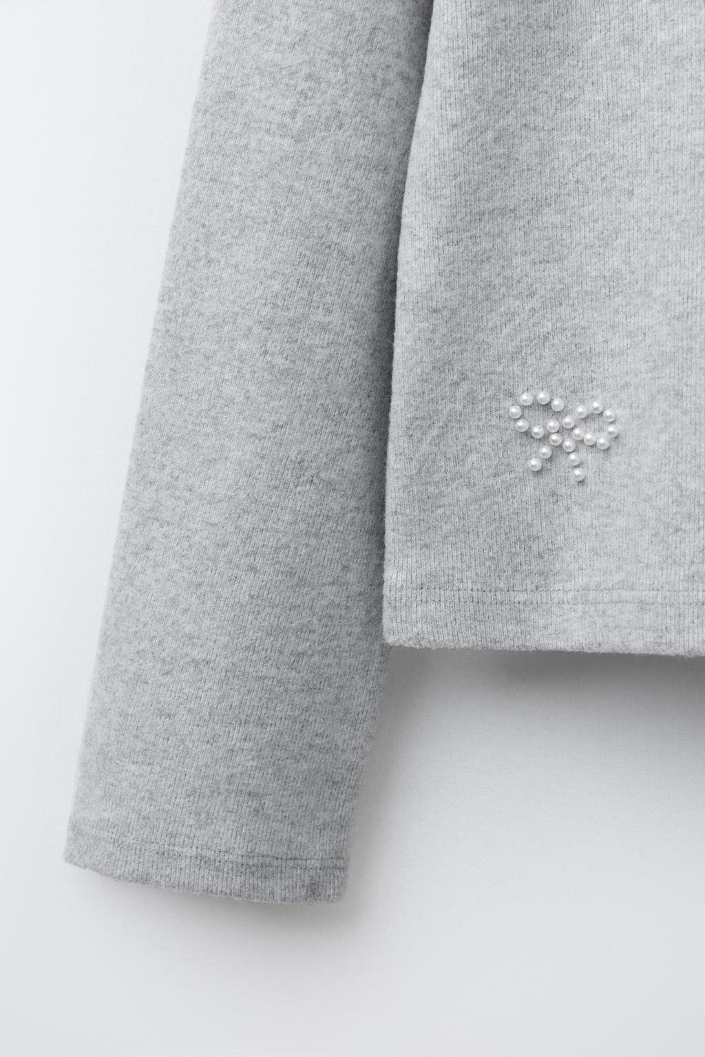 ЛОНГСЛИВ SOFT TOUCH С БАНТАМИ И БУСИНАМИ