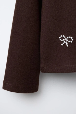 Лонгслив SOFT TOUCH с бантом и бусинами- Заказать в России