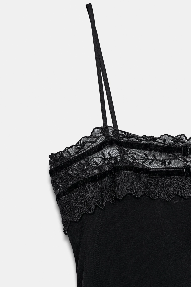 Топ из георгетты с бантами