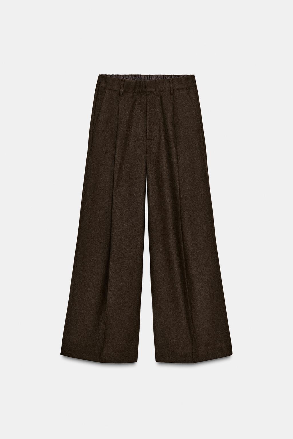 БРЮКИ С ЗАЩИПАМИ И КАРМАНАМИ