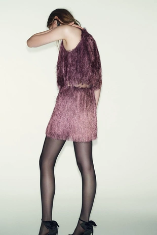 Короткая юбка с бахромой- Заказать в России