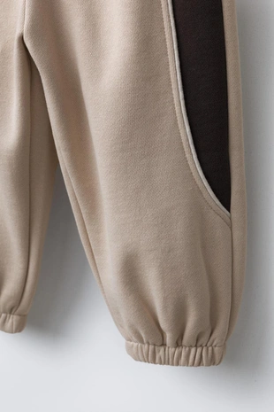 Брюки-джоггеры в стиле колор-блок- Заказать в России