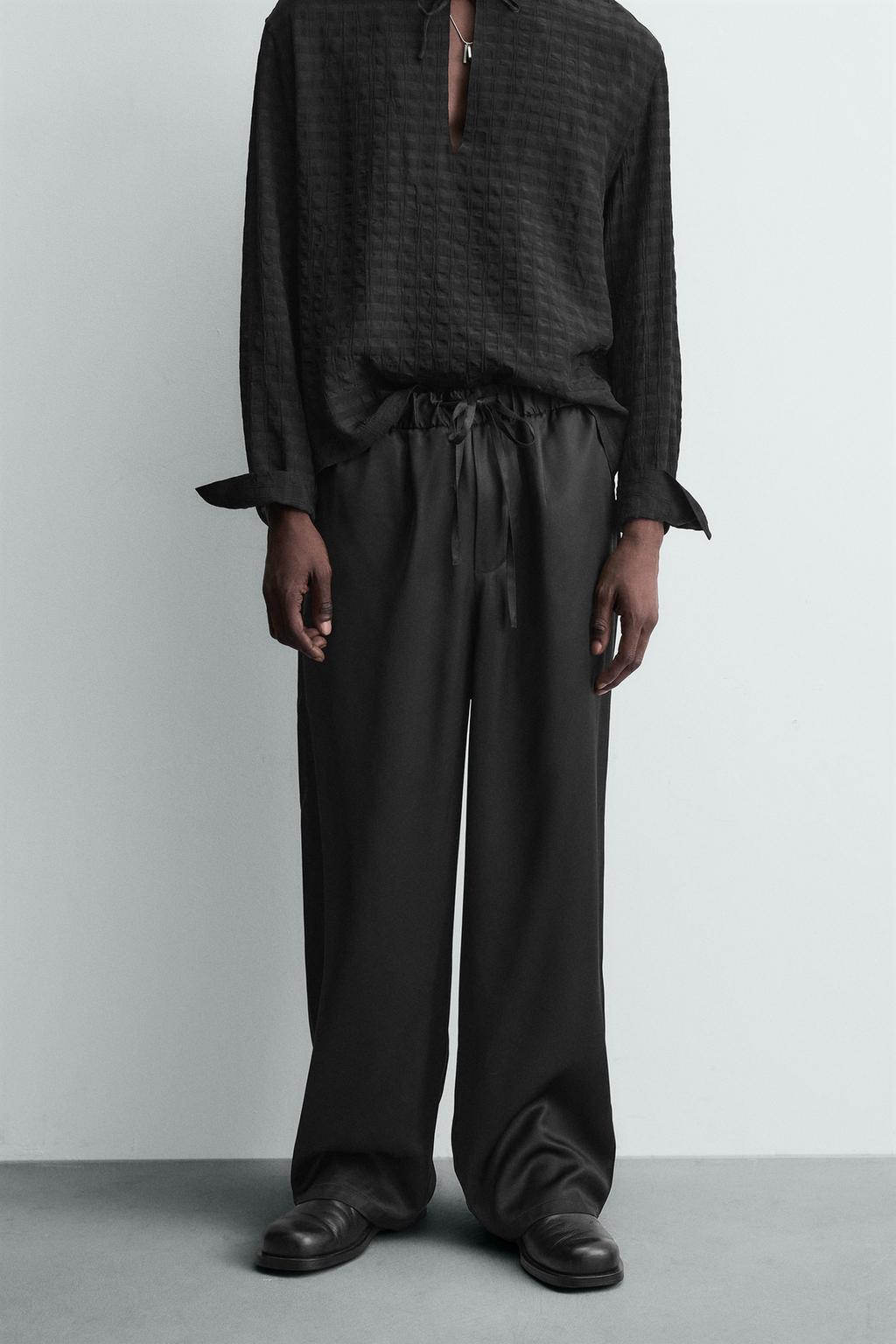 СТРУЯЩИЕСЯ БРЮКИ-ДЖОГГЕРЫ