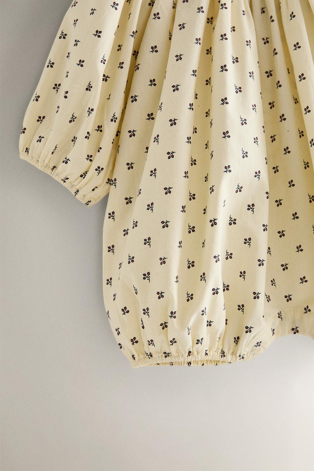 Пеленальный комбинезон с цветочным узором