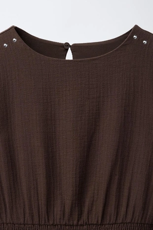 Платье с воланами и заклепками- Заказать в России