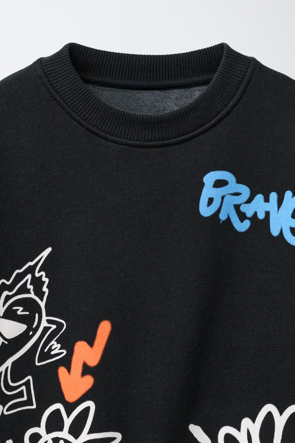 ТОЛСТОВКА С ПРИНТОМ «ГРАФФИТИ»