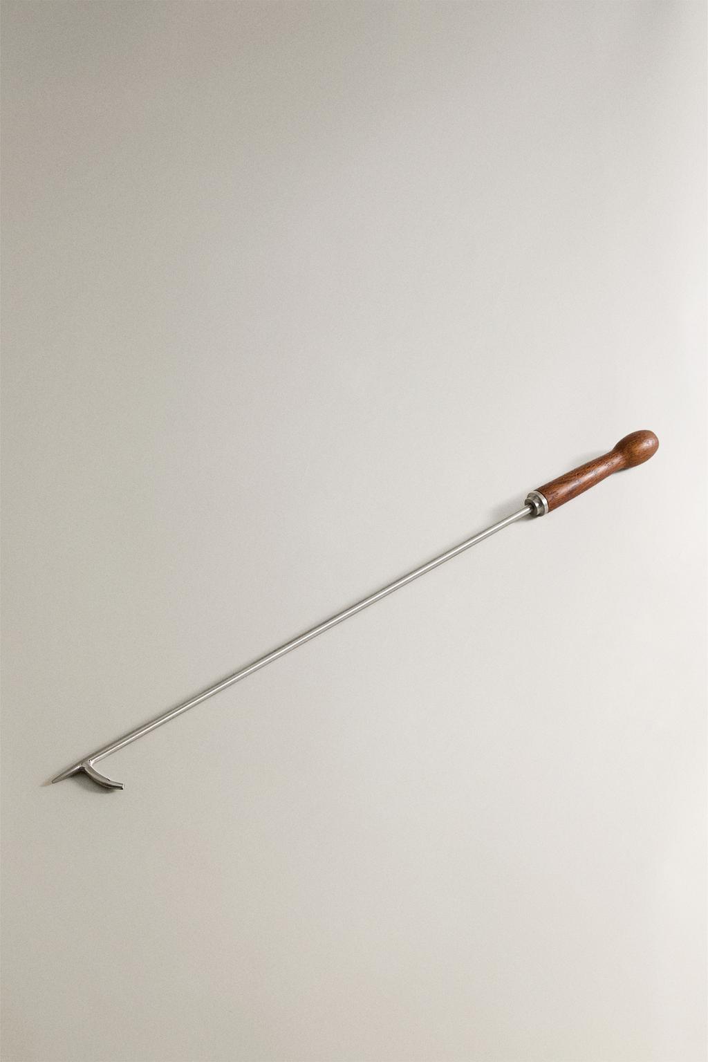 Стальная толкалка для камина