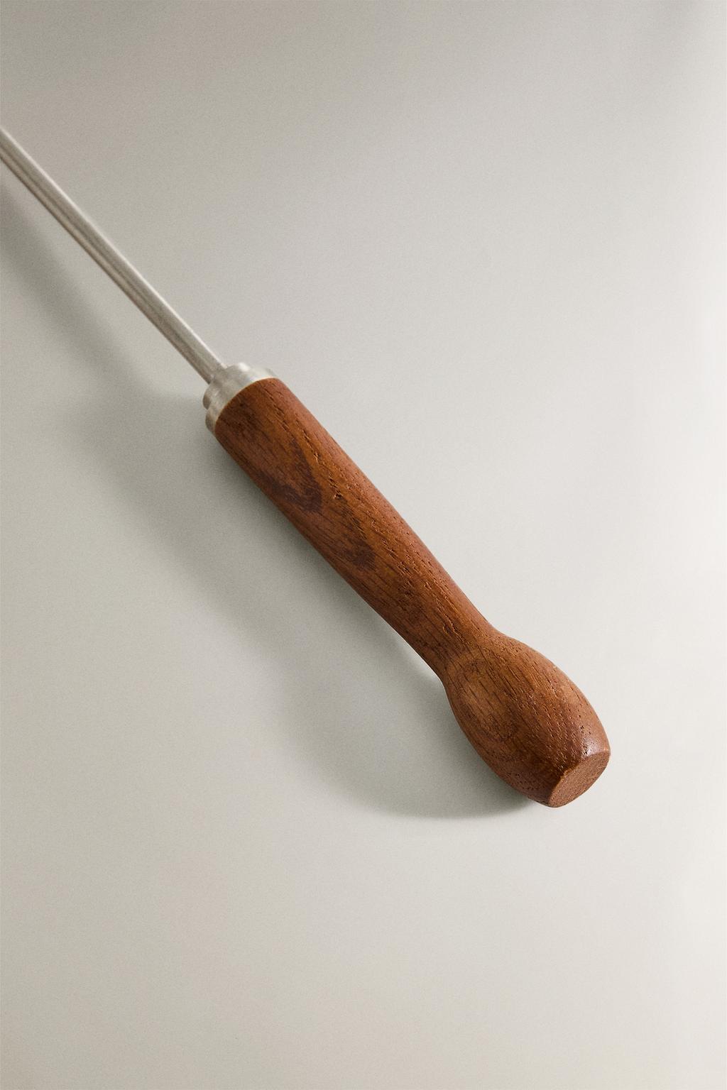 Стальная толкалка для камина