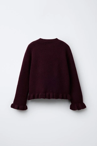 Вязаный джемпер с воланами- Заказать в России