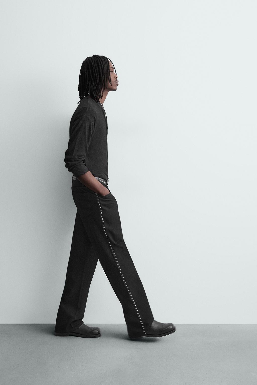 ДЖИНСЫ FLARE FIT С ЗАКЛЕПКАМИ