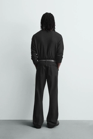 Джинсы FLARE FIT с заклепками- Заказать в России