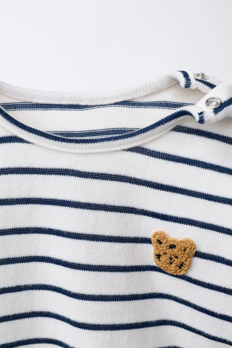 Футболка в полоску с нашивкой тигра из футбольной ткани