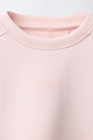 Толстовка с комбинированными сетчатыми вставками и надписью- Заказать в России