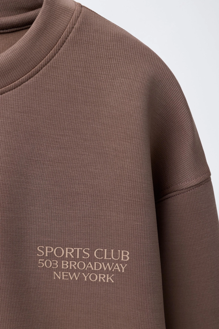 Толстовка с лозунгом и модалом