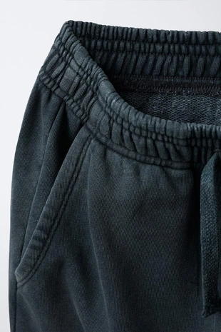 Брюки WIDE LEG с эффектом потертости, звездами и заклепками- Заказать в России