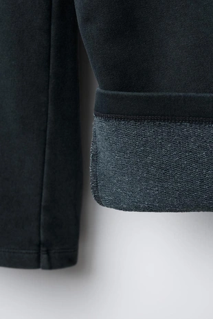 Брюки WIDE LEG с эффектом потертости, звездами и заклепками- Заказать в России