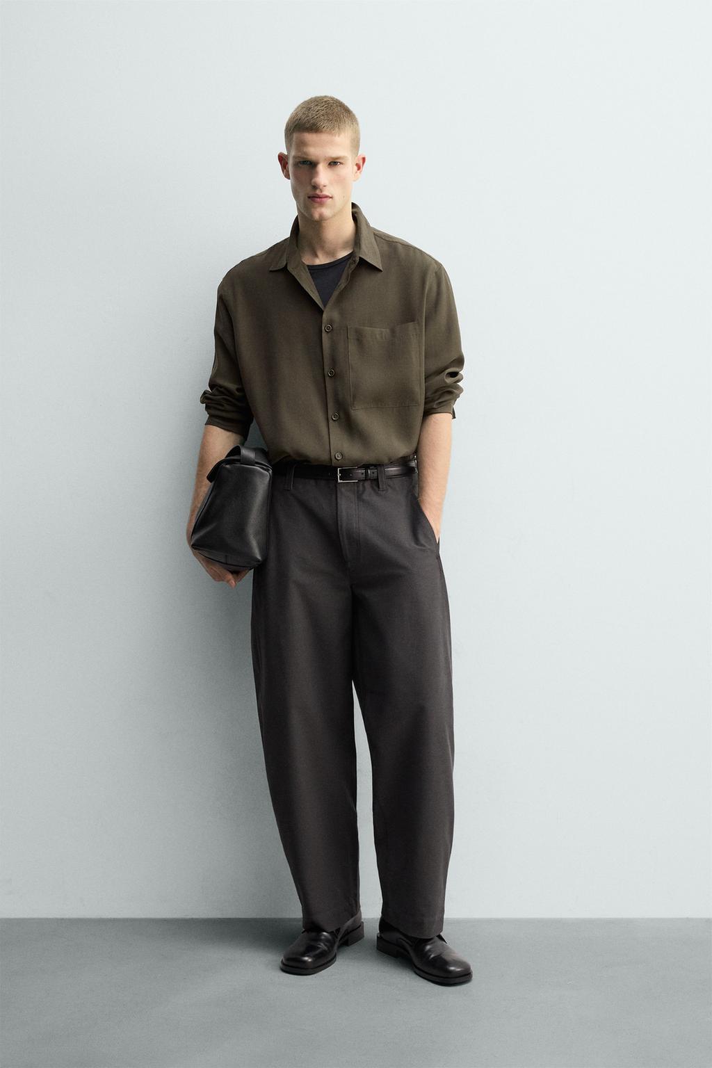 РУБАШКА СТРУЯЩЕГОСЯ ПОКРОЯ С КАРМАНОМ