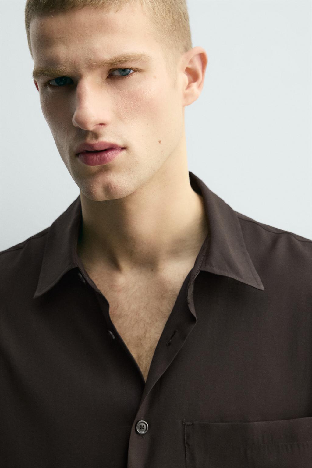 РУБАШКА СТРУЯЩЕГОСЯ ПОКРОЯ С КАРМАНОМ