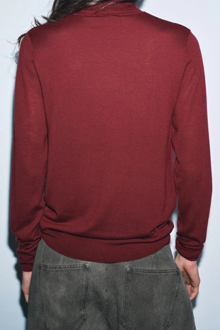 Свитер из шерсти с высоким воротником- Заказать в России