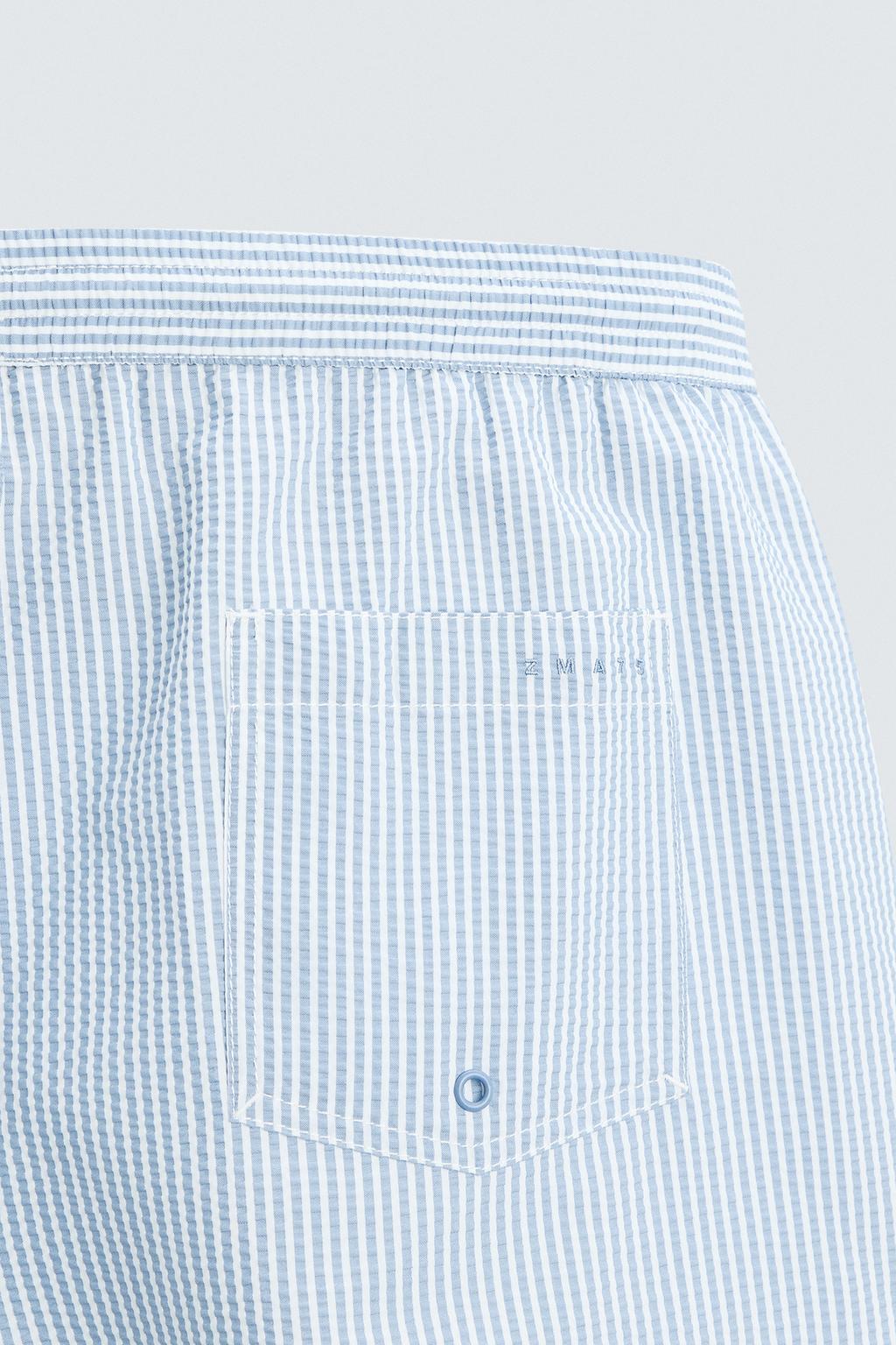 Полупрозрачные плавательные трусы средней длины