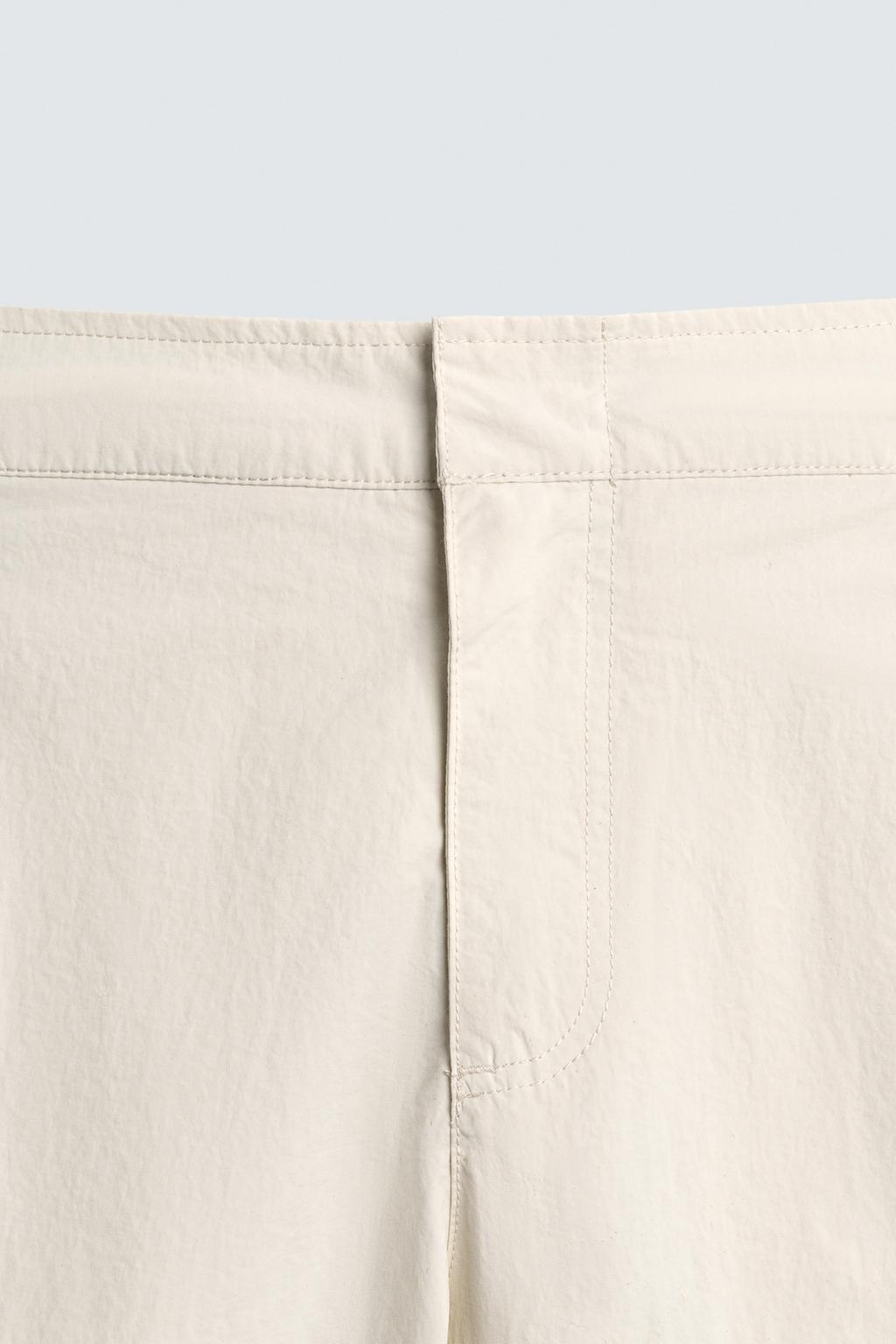 Длинные структурированные плавательные трусы