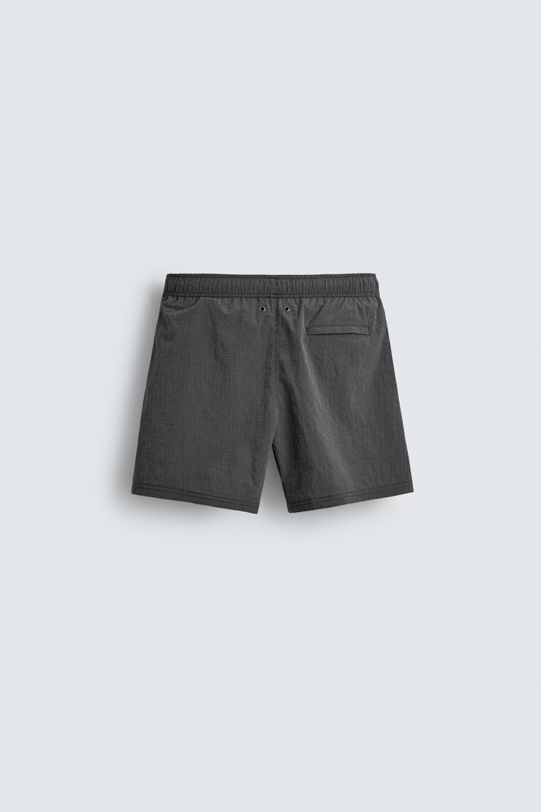 Полосатые плавательные шорты