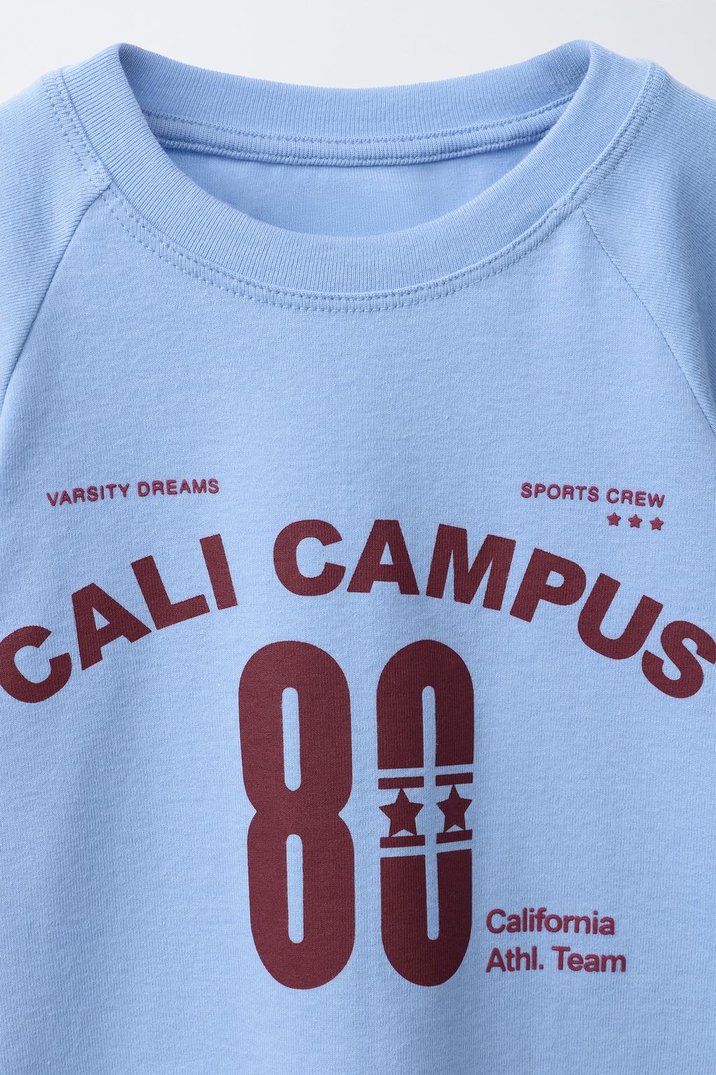 ФУТБОЛКА С ОБЪЕМНЫМИ РУКАВАМИ И НАДПИСЬЮ