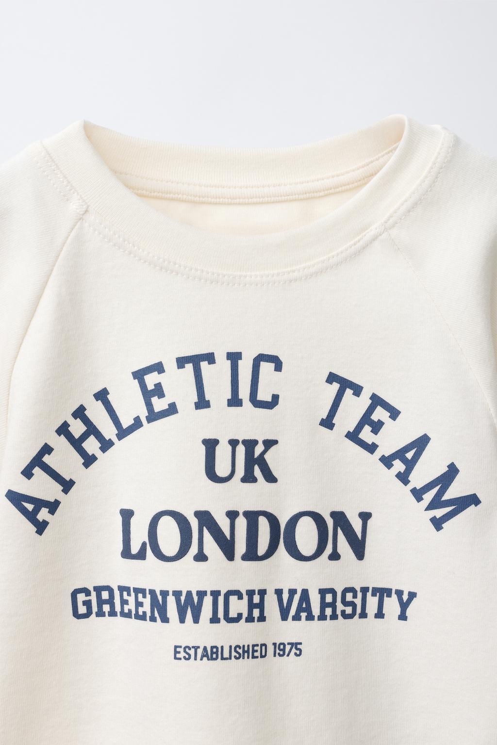 ФУТБОЛКА С ОБЪЕМНЫМИ РУКАВАМИ И НАДПИСЬЮ