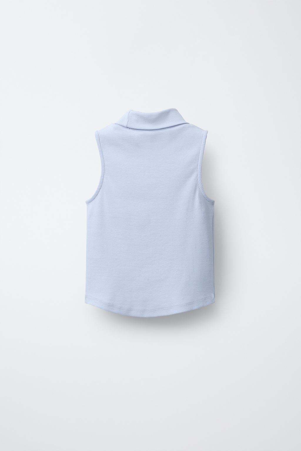 ТОП В РУБЧИК С ВОРОТНИКОМ-СТОЙКОЙ И ЗАКЛЕПКАМИ В ВИДЕ СЕРДЕЦ