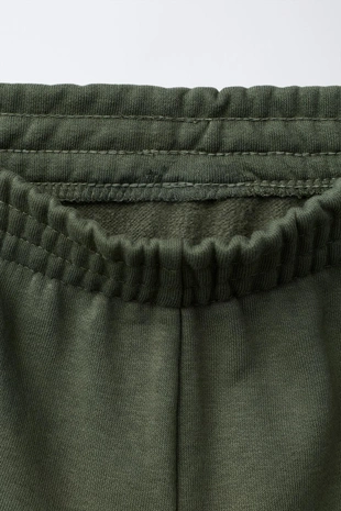 Брюки-джоггеры из мягкой ткани с надписью- Заказать в России