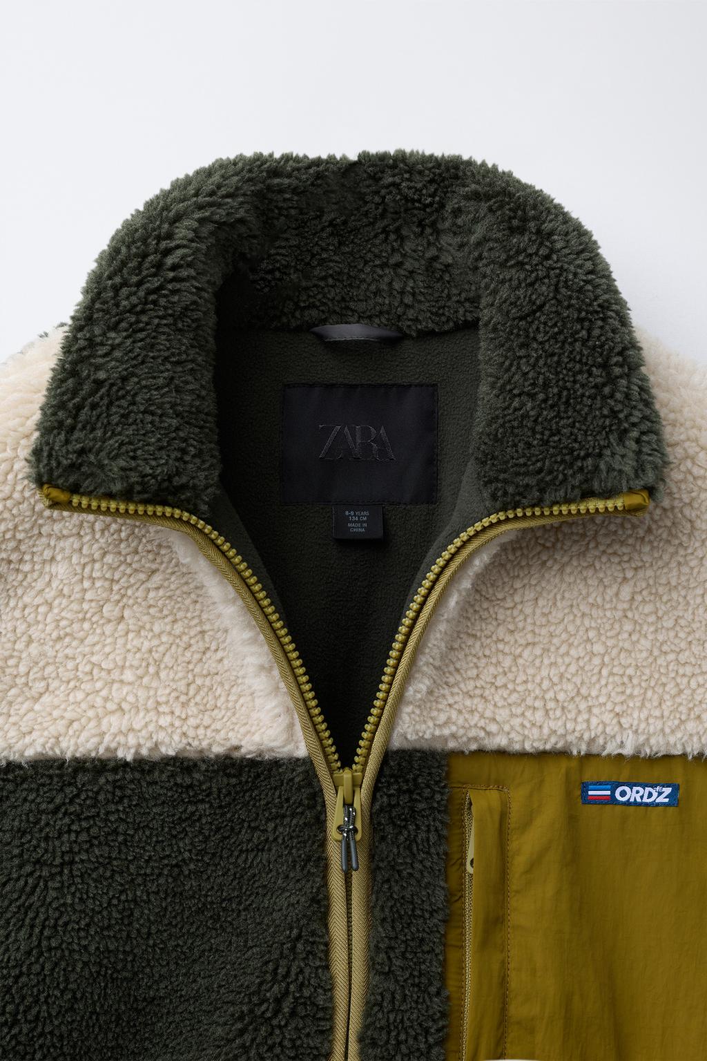 КУРТКА ИЗ ИСКУССТВЕННОЙ ОВЧИНЫ В СТИЛЕ КОЛОР-БЛОК