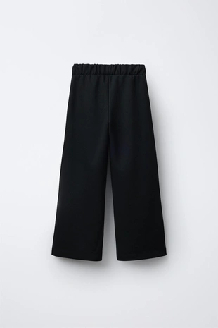 Брюки костюмные с пряжками- Заказать в России