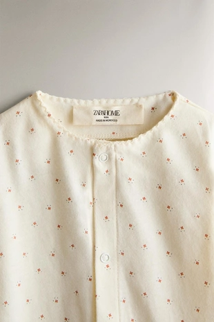 Детский комбинезон с цветочным принтом- Заказать в России