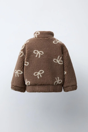 Куртка из искусственной овчины с бантами- Заказать в России