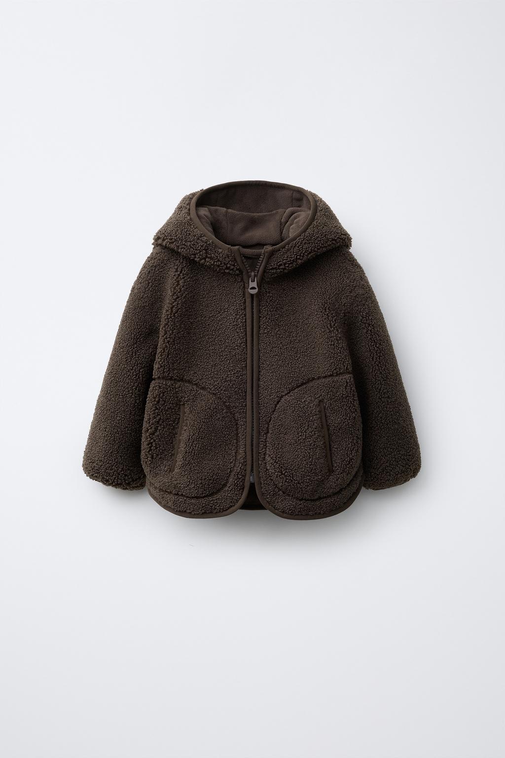 КУРТКА ИЗ ИСКУССТВЕННОЙ ОВЧИНЫ С КАПЮШОНОМ