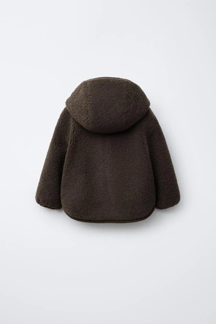 Куртка из искусственной овчины с капюшоном- Заказать в России