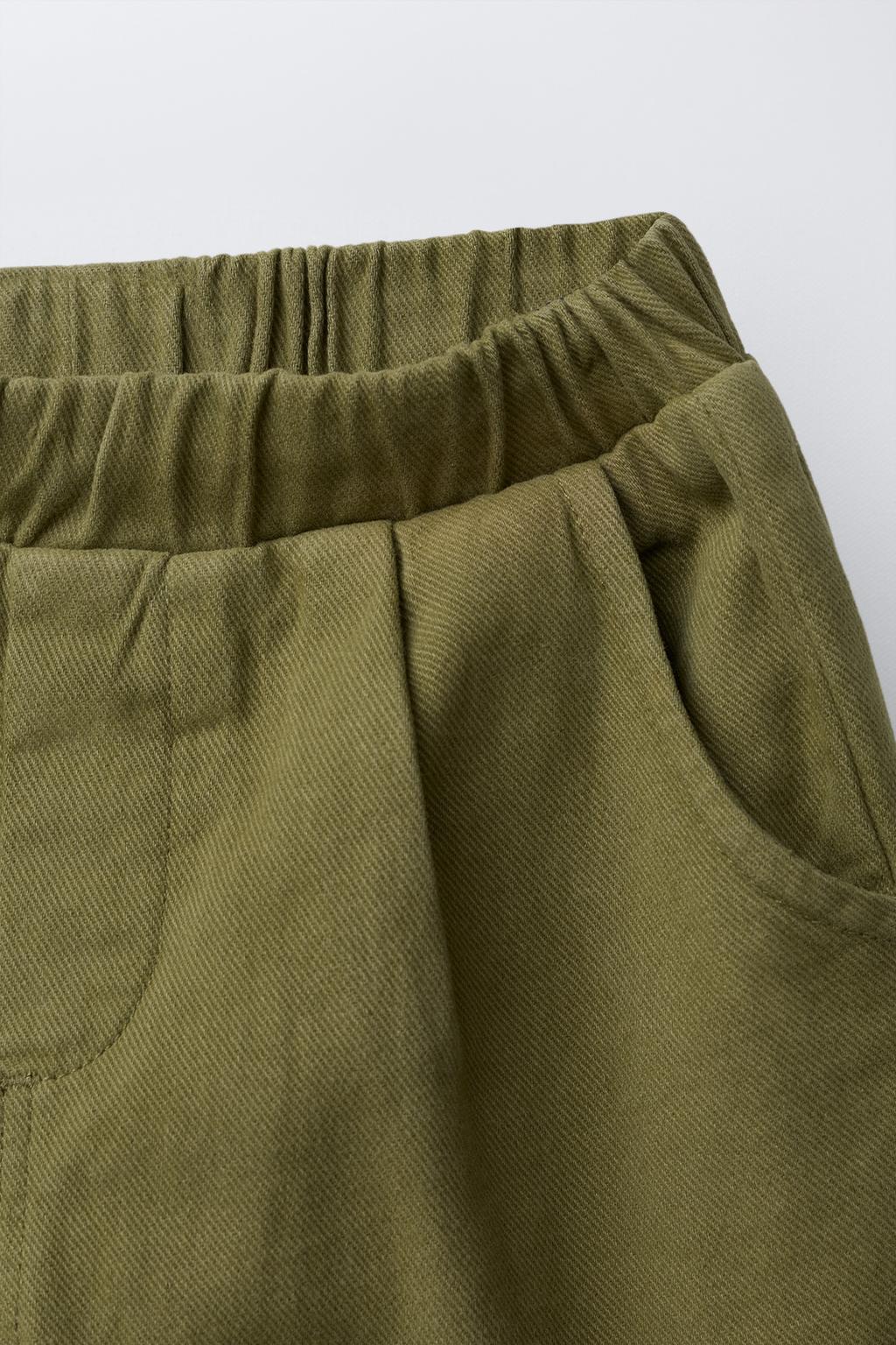 БРЮКИ СВОБОДНОГО КРОЯ ИЗ ТВИЛА С НАШИВКАМИ