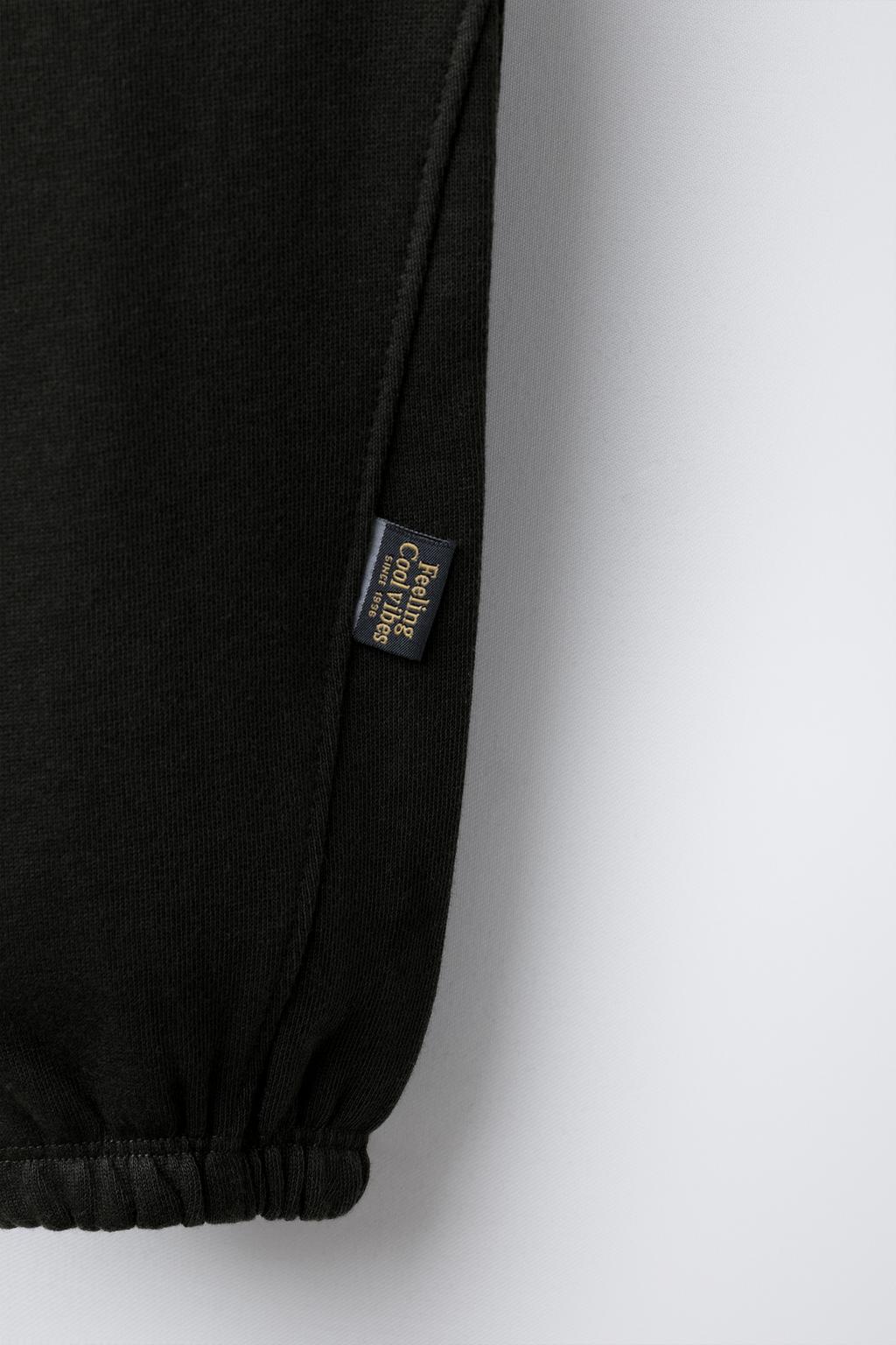 БРЮКИ-ДЖОГГЕРЫ С ЭТИКЕТКОЙ