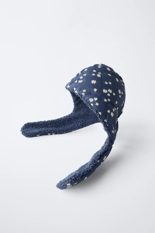 Стеганный капюшон с принтом ромашек- Заказать в России