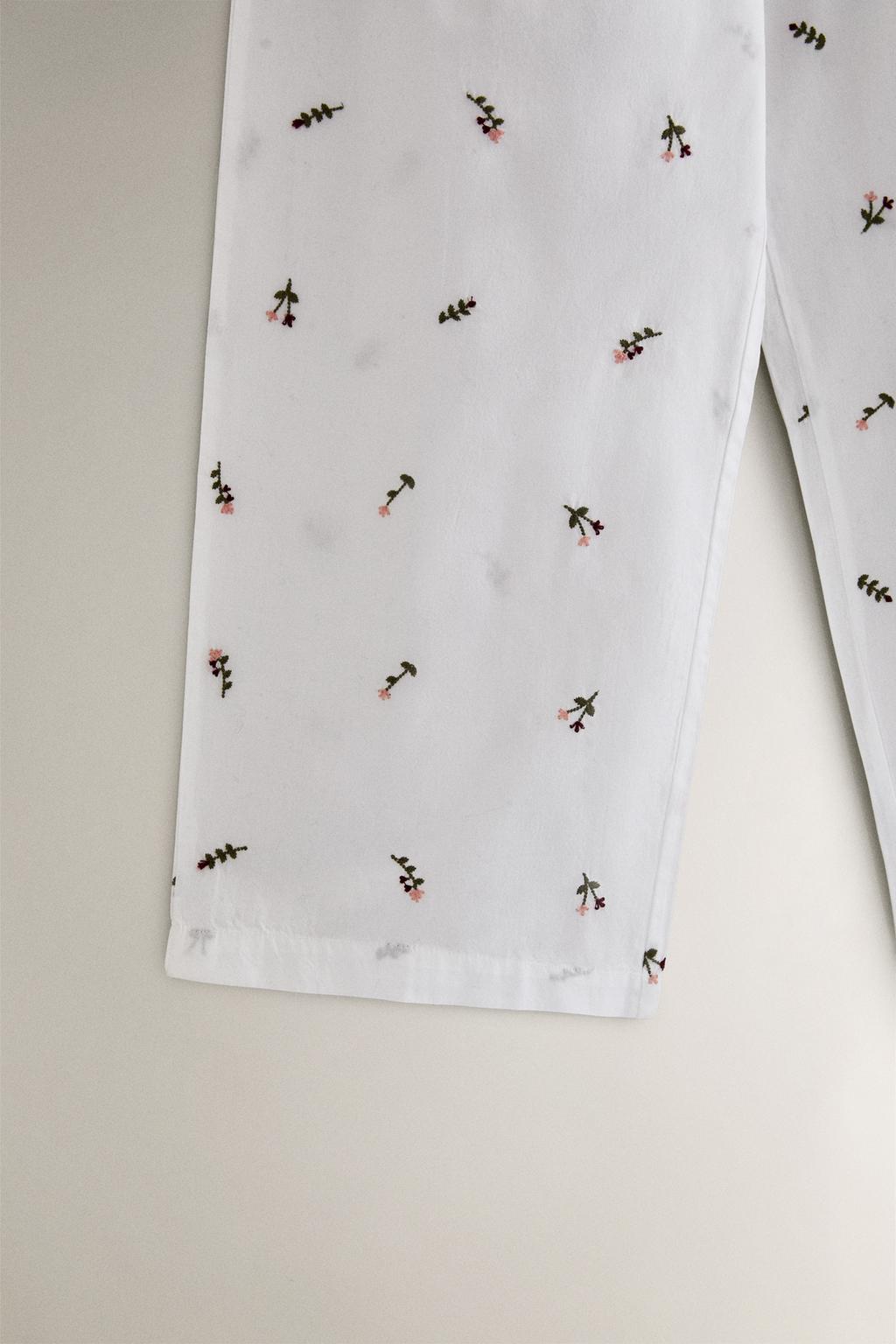 Брюки с цветочной вышивкой