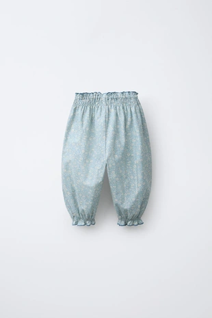 Брюки с цветочным принтом- Заказать в России