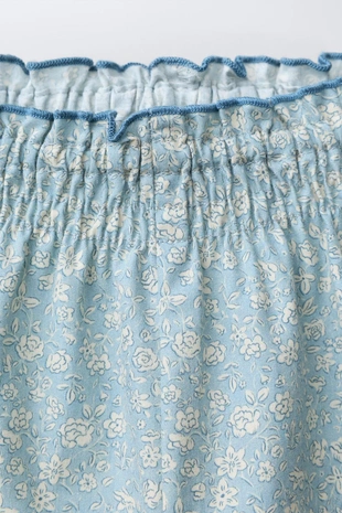 Брюки с цветочным принтом- Заказать в России