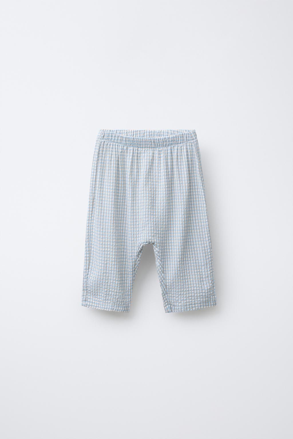 БРЮКИ ИЗ РЕЛЬЕФНОЙ ТКАНИ В КЛЕТКУ