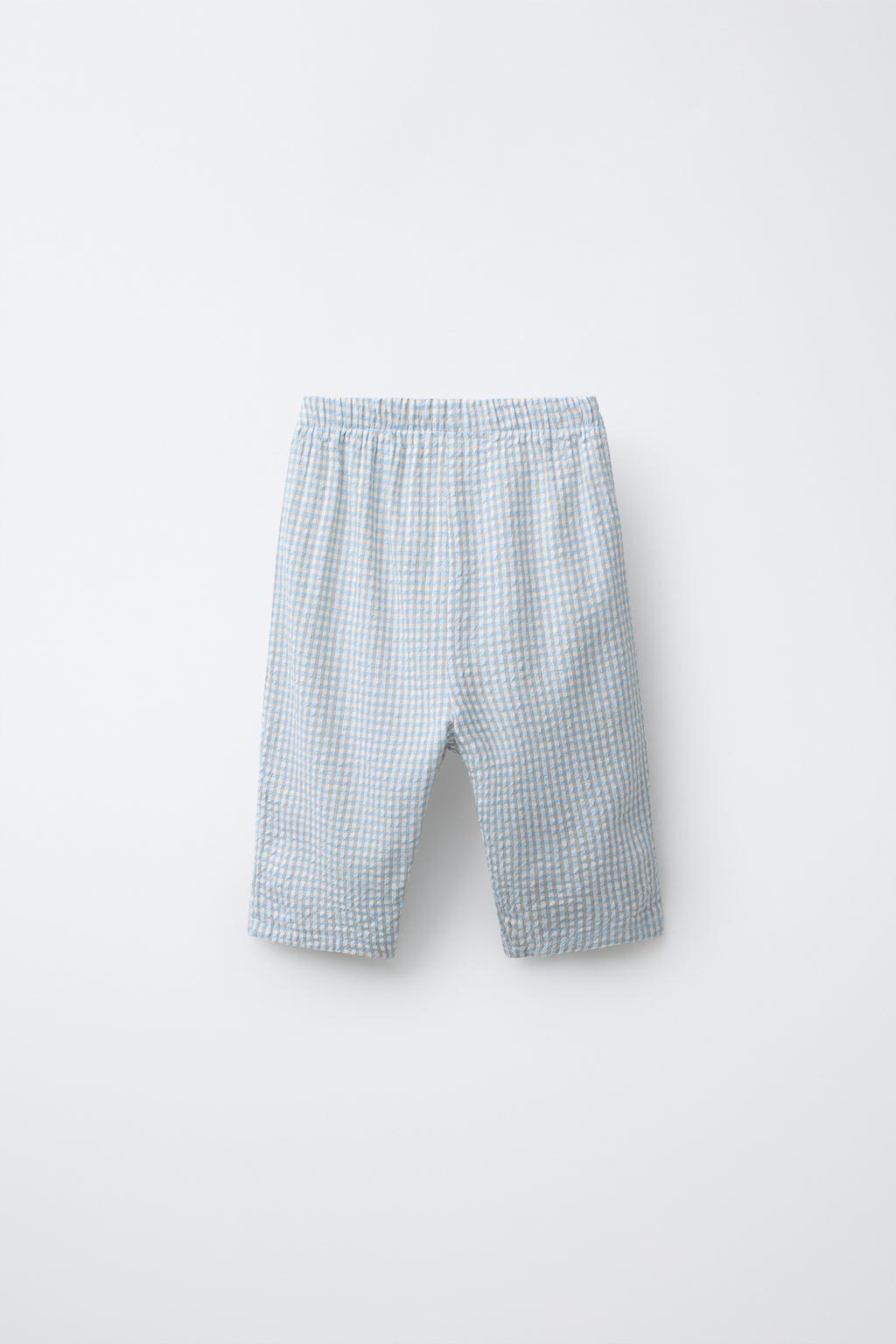 БРЮКИ ИЗ РЕЛЬЕФНОЙ ТКАНИ В КЛЕТКУ